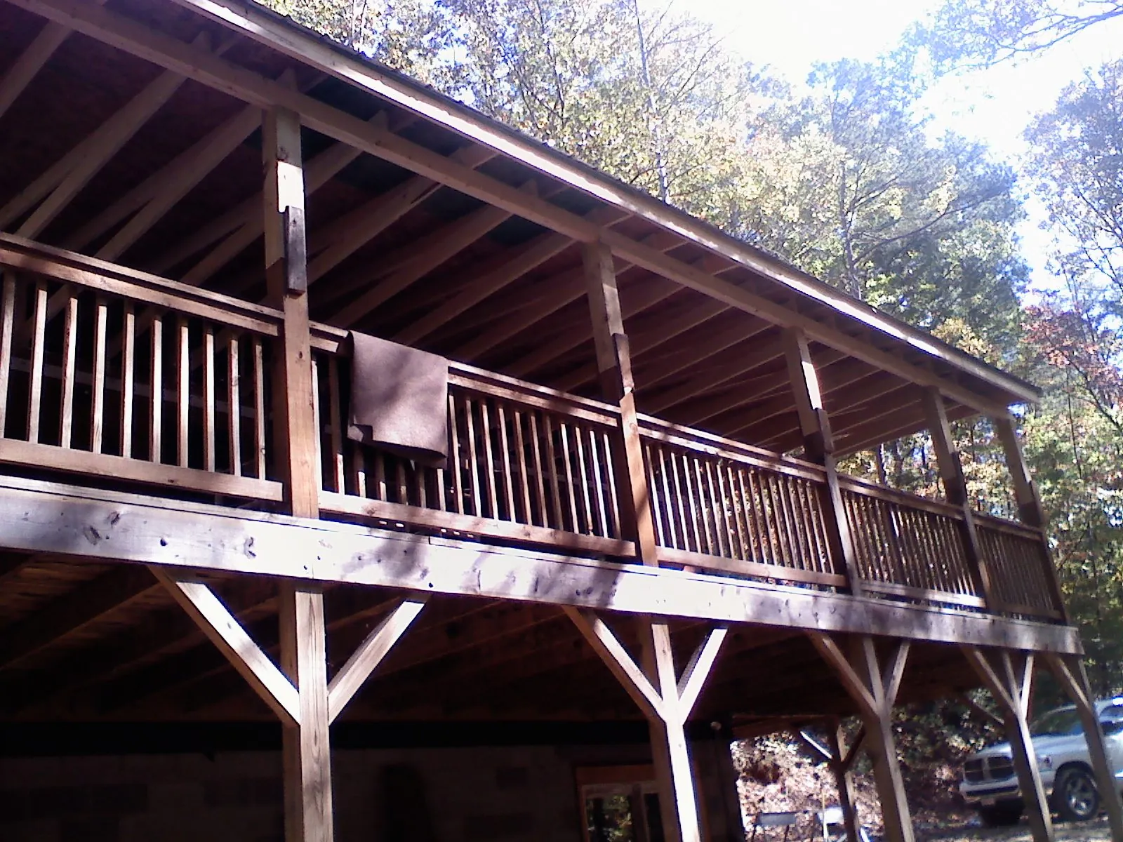 Timber framing under a new elevated porch and deck — Roof Leak Repair in Wausaukee by Roofing Brothers